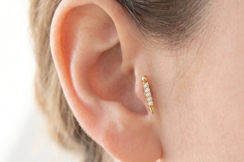 Piercing Trago Dorato