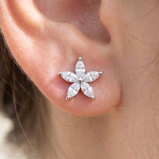 Flower Ear Piercings – selection on linen