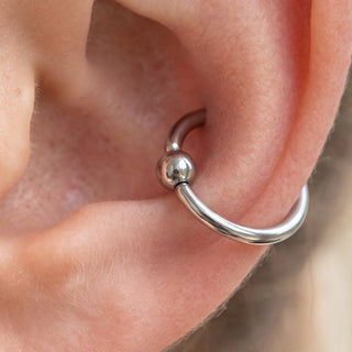 Titanium Conch Piercing – selection on linen