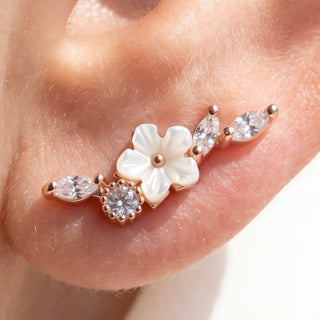 Leaf Ear Piercings – selection on linen